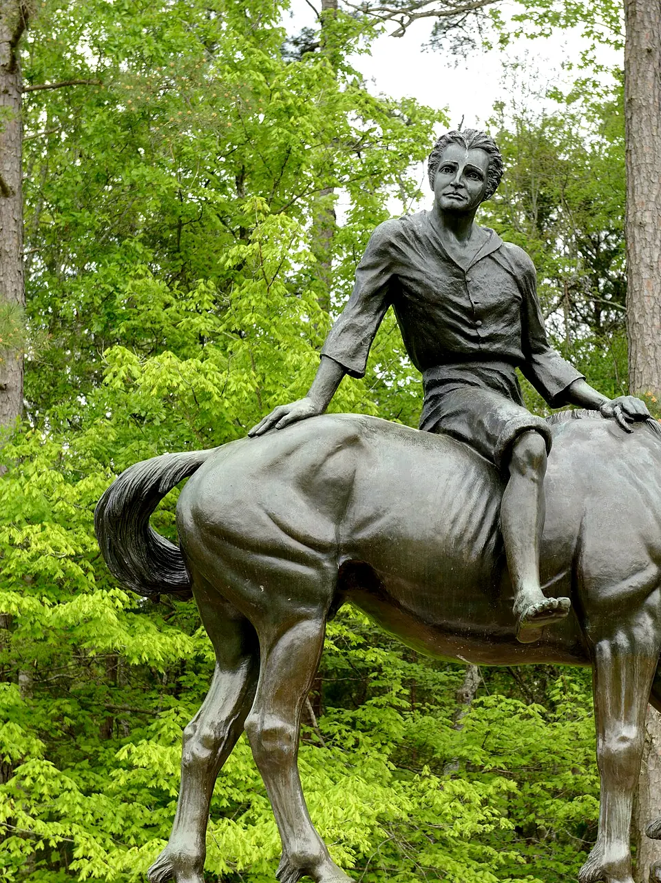 Bronze statue of a young Andrew Jackson seated on a horse among green trees at Andrew Jackson State Park near Lancaster, SC
